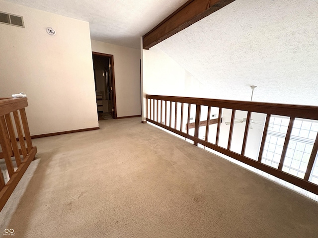 6458 Watham Ct, Indianapolis, IN 46250 - corridor with light colored carpet and a textured ceiling