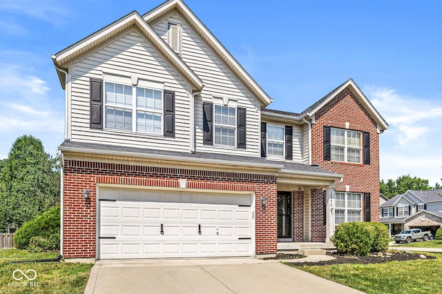 12034 Gatwick View Dr, Fishers, IN 46037 - traditional-style home with brick siding, concrete driveway, and an attached garage