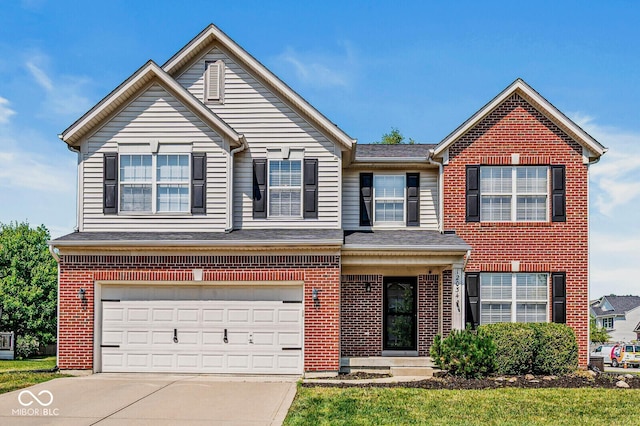 12034 Gatwick View Dr, Fishers, IN 46037 - view of front facade featuring brick siding, concrete driveway, and a garage