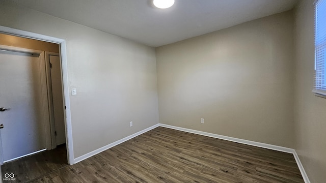 4107 Weaver Ave, Indianapolis, IN 46227 - empty room featuring dark wood-style floors and baseboards