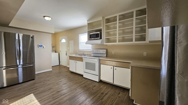 4107 Weaver Ave, Indianapolis, IN 46227 - kitchen with appliances with stainless steel finishes, washer / dryer, dark wood-style floors, under cabinet range hood, and light countertops