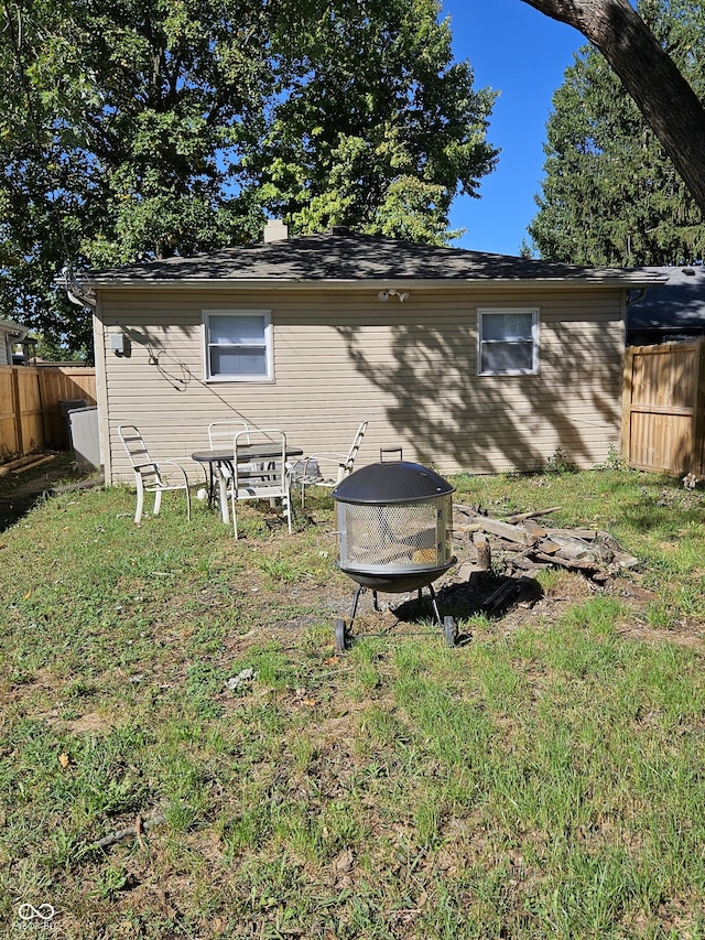 4107 Weaver Ave, Indianapolis, IN 46227 - rear view of property with a fire pit