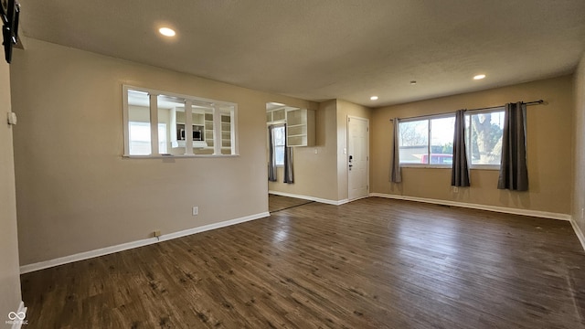 4107 Weaver Ave, Indianapolis, IN 46227 - spare room featuring dark wood-type flooring and recessed lighting