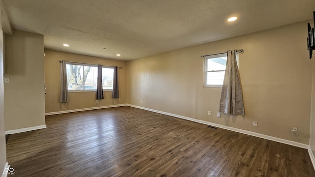 4107 Weaver Ave, Indianapolis, IN 46227 - spare room with dark wood finished floors, recessed lighting, and a textured ceiling