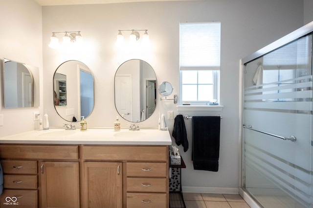 12985 Merlot Ln, Fishers, IN 46037 - bathroom featuring double vanity, a shower stall, and tile patterned flooring