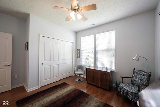 12985 Merlot Ln, Fishers, IN 46037 - office featuring healthy amount of natural light, wood finished floors, a textured ceiling, and a ceiling fan