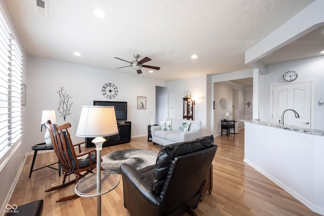 12985 Merlot Ln, Fishers, IN 46037 - living area with ceiling fan, light wood-style flooring, and recessed lighting