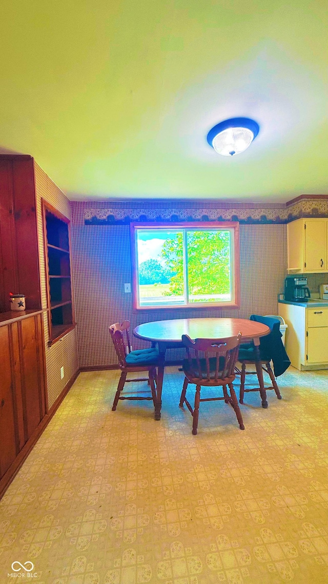 5964 E 250 N, Greenfield, IN 46140 - dining room with breakfast area, light floors, and wallpapered walls