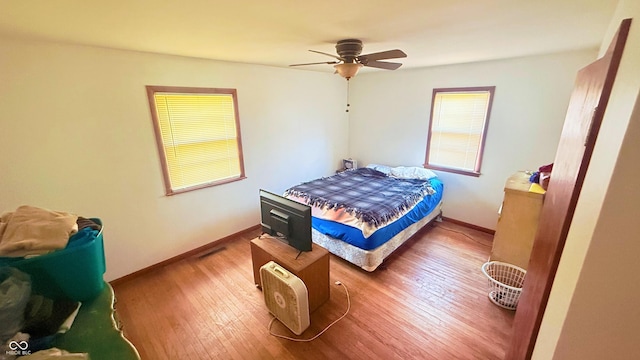 5964 E 250 N, Greenfield, IN 46140 - bedroom featuring wood finished floors and a ceiling fan