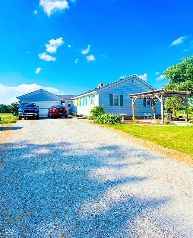 5964 E 250 N, Greenfield, IN 46140 - view of front of house with gravel driveway and a pergola