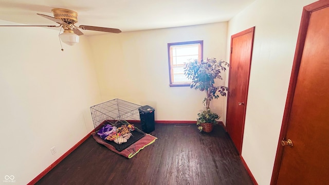 5964 E 250 N, Greenfield, IN 46140 - spare room with wood finished floors and a ceiling fan