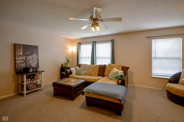 14521 Stewart Cir, Fishers, IN 46038 - carpeted living room with ceiling fan and a textured ceiling