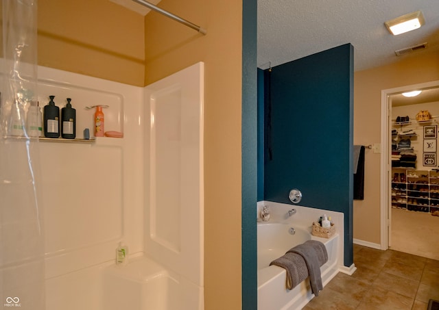 14521 Stewart Cir, Fishers, IN 46038 - full bath with a bath, tile patterned floors, a shower, and a textured ceiling