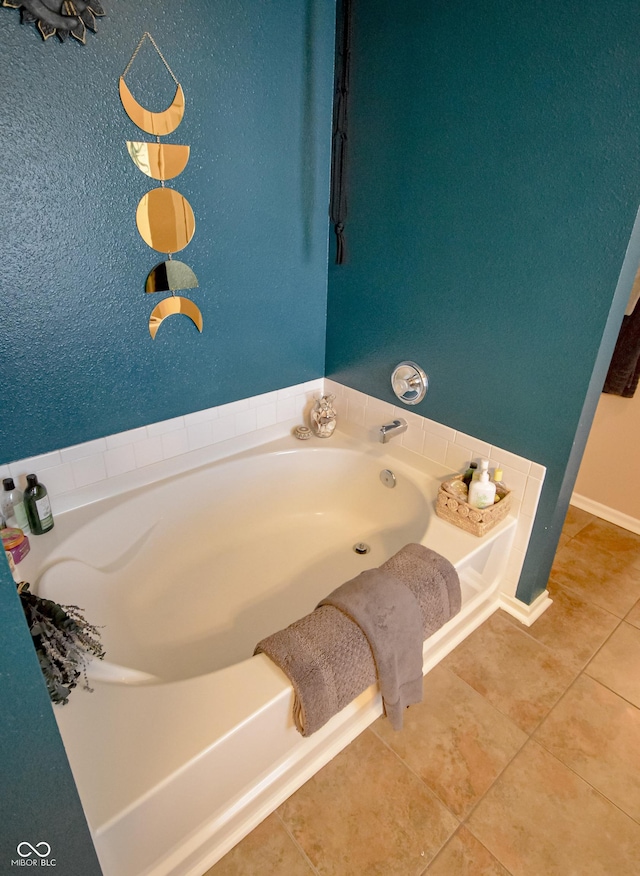 14521 Stewart Cir, Fishers, IN 46038 - bathroom featuring tile patterned flooring and a garden tub