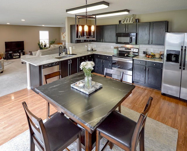 14521 Stewart Cir, Fishers, IN 46038 - dining space featuring light wood-style flooring and recessed lighting