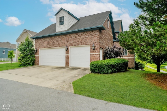 7178 Lockford Walk N, Avon, IN 46123 - view of property exterior featuring brick siding, concrete driveway, a lawn, and an attached garage