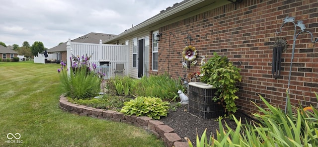5333 Thornridge Pl, Indianapolis, IN 46237 - view of side of home with brick siding and a yard