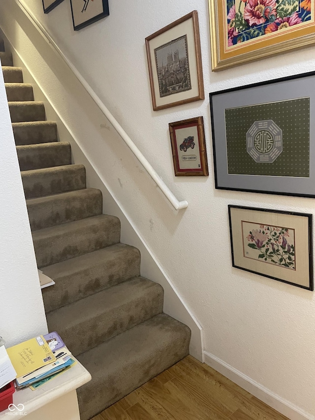5333 Thornridge Pl, Indianapolis, IN 46237 - staircase with wood finished floors and baseboards