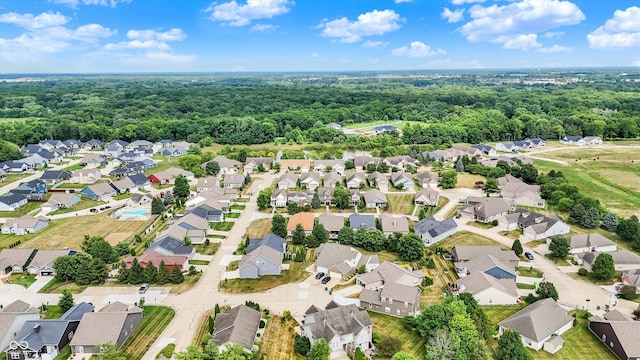 4219 Trilithon Ct, West Lafayette, IN 47906 - aerial view of property and surrounding area with nearby suburban area and a forest