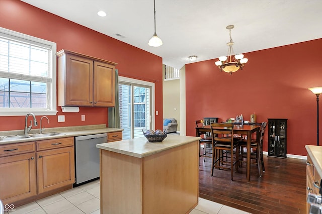 4219 Trilithon Ct, West Lafayette, IN 47906 - kitchen featuring dishwasher, light countertops, pendant lighting, a chandelier, and a center island