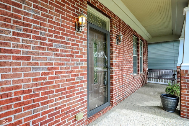 4219 Trilithon Ct, West Lafayette, IN 47906 - property entrance featuring a porch and brick siding