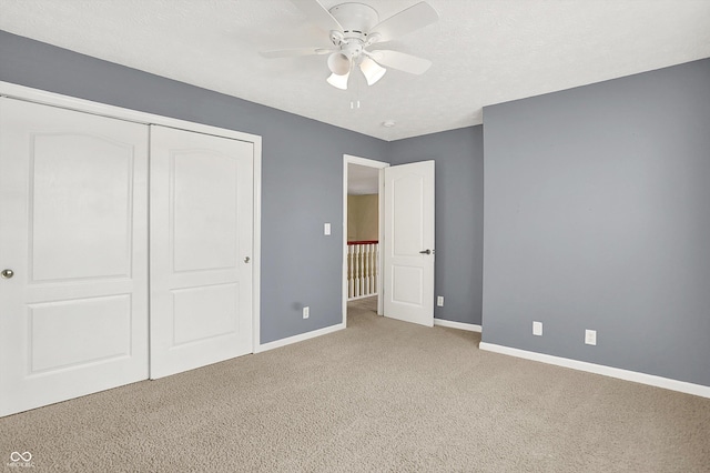 4219 Trilithon Ct, West Lafayette, IN 47906 - unfurnished bedroom with light colored carpet, a closet, and a ceiling fan
