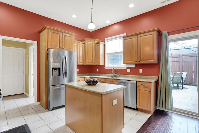4219 Trilithon Ct, West Lafayette, IN 47906 - kitchen with appliances with stainless steel finishes, light countertops, hanging light fixtures, a center island, and recessed lighting