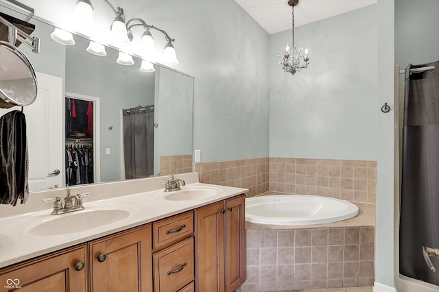 4219 Trilithon Ct, West Lafayette, IN 47906 - bathroom with a bath, double vanity, a walk in closet, a shower, and tile patterned floors