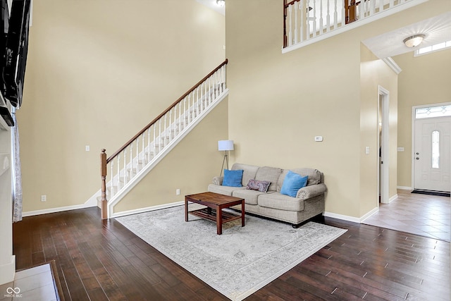 4219 Trilithon Ct, West Lafayette, IN 47906 - living area featuring hardwood / wood-style floors, a high ceiling, and stairs