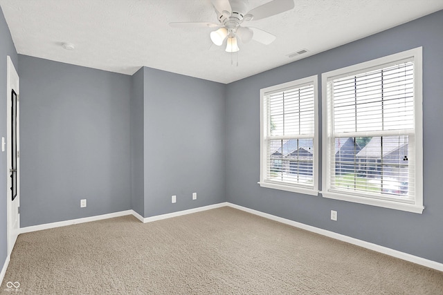 4219 Trilithon Ct, West Lafayette, IN 47906 - carpeted spare room with ceiling fan, a textured ceiling, and a smoke detector