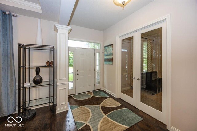 15540 Provincial Ln, Fishers, IN 46040 - foyer entrance with french doors, dark wood finished floors, and ornate columns