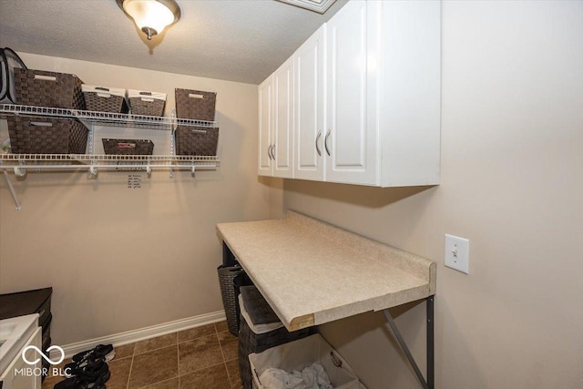 15540 Provincial Ln, Fishers, IN 46040 - laundry area with baseboards and a textured ceiling