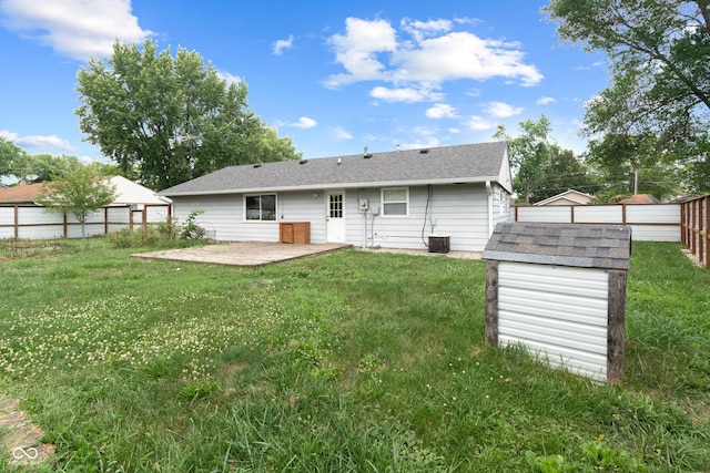 1108 Warwick Dr, New Whiteland, IN 46184 - rear view of property with a patio area and a storage unit