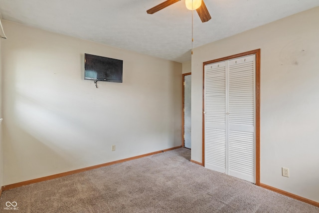 1108 Warwick Dr, New Whiteland, IN 46184 - unfurnished bedroom featuring carpet flooring, a closet, and ceiling fan