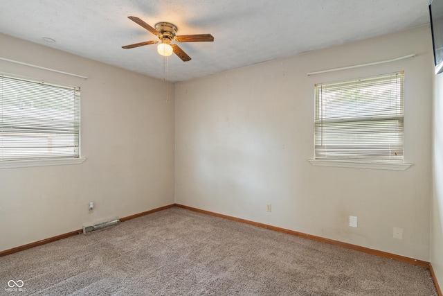 1108 Warwick Dr, New Whiteland, IN 46184 - carpeted spare room featuring ceiling fan and baseboards