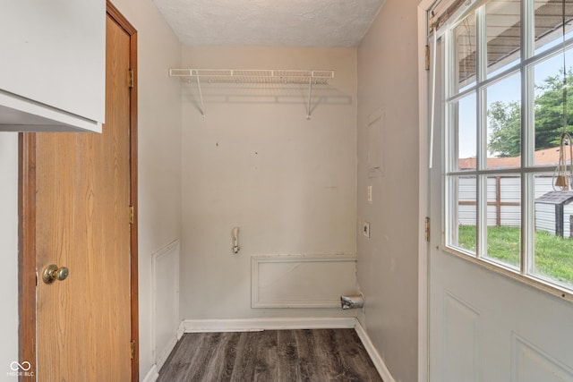 1108 Warwick Dr, New Whiteland, IN 46184 - washroom featuring baseboards and wood finished floors
