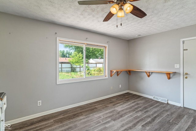 1108 Warwick Dr, New Whiteland, IN 46184 - unfurnished room with a textured ceiling, wood finished floors, and ceiling fan