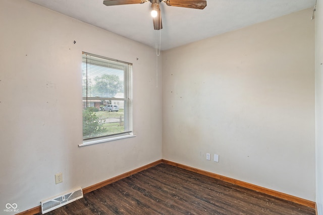 1108 Warwick Dr, New Whiteland, IN 46184 - empty room featuring dark wood-style floors and a ceiling fan