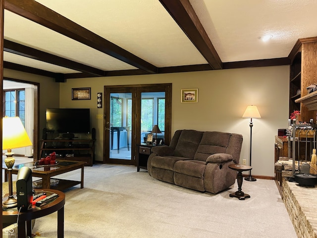 8413 Catamaran Dr, Indianapolis, IN 46236 - living room with light colored carpet, beamed ceiling, and french doors