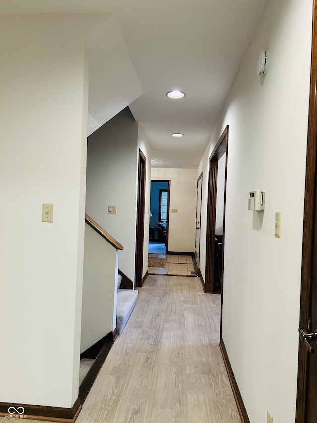 8413 Catamaran Dr, Indianapolis, IN 46236 - hall featuring recessed lighting, light wood-style flooring, and stairway