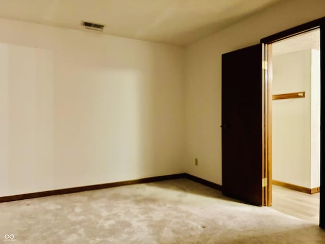8413 Catamaran Dr, Indianapolis, IN 46236 - spare room featuring baseboards and carpet flooring