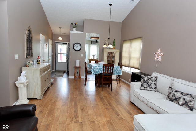 2909 Inverrary Ct, Indianapolis, IN 46234 - living area with plenty of natural light, light wood-type flooring, and a towering ceiling