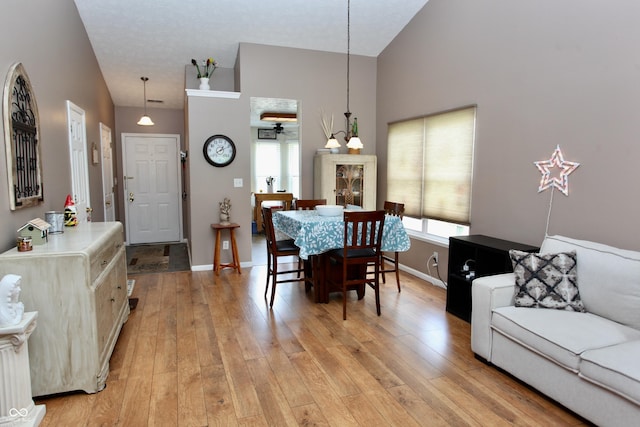 2909 Inverrary Ct, Indianapolis, IN 46234 - dining area with light wood finished floors and lofted ceiling