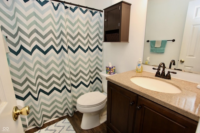 2909 Inverrary Ct, Indianapolis, IN 46234 - bathroom featuring vanity, a shower with curtain, and wood finished floors