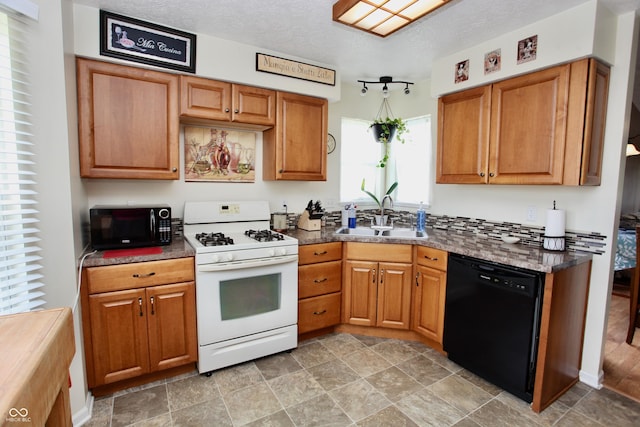 2909 Inverrary Ct, Indianapolis, IN 46234 - kitchen with black appliances, brown cabinetry, and stone finish flooring