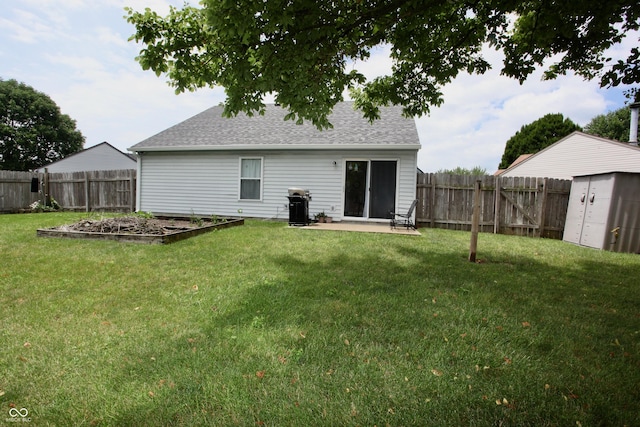 2909 Inverrary Ct, Indianapolis, IN 46234 - rear view of house featuring a fenced backyard, a garden, a storage shed, and a patio