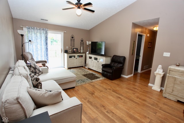 2909 Inverrary Ct, Indianapolis, IN 46234 - living room with lofted ceiling, a ceiling fan, and light wood-style floors