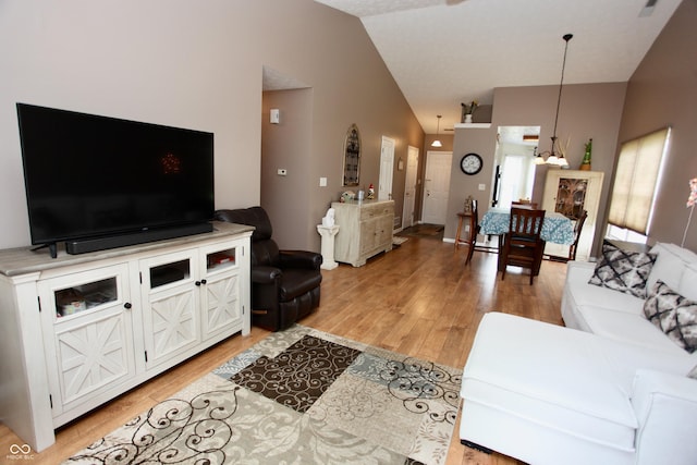 2909 Inverrary Ct, Indianapolis, IN 46234 - living room with light wood-style flooring and high vaulted ceiling