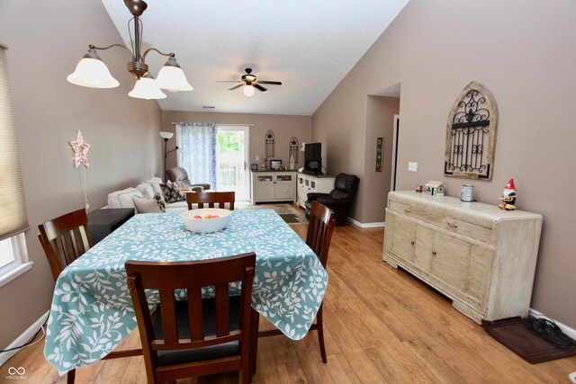 2909 Inverrary Ct, Indianapolis, IN 46234 - dining room featuring light wood-style flooring, vaulted ceiling, and ceiling fan