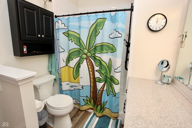 2909 Inverrary Ct, Indianapolis, IN 46234 - bathroom with a shower with shower curtain, vanity, and wood finished floors